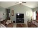 Open living room featuring vaulted ceiling, ceiling fan, and neutral paint at 242 Four Mile Rd., Conway, SC 29526