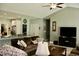 Open-concept living room with adjacent kitchen, granite counters, stainless steel appliances at 242 Four Mile Rd., Conway, SC 29526