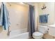 Clean bathroom with shower-tub combo, nautical accents, and tile flooring at 2501 S Ocean Blvd. # 503, Myrtle Beach, SC 29577