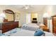 Spacious bedroom featuring two beds, dresser, and stylish decor at 2501 S Ocean Blvd. # 503, Myrtle Beach, SC 29577