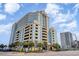 Low angle exterior shot of a large building displaying it's unique and colorful architecture at 2501 S Ocean Blvd. # 503, Myrtle Beach, SC 29577