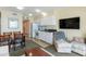 Cozy, fully furnished condo interior featuring a kitchen, eating area, and lounge area at 2501 S Ocean Blvd. # 503, Myrtle Beach, SC 29577