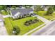 Aerial view of a well-maintained single-Gathering home with a green lawn and beautiful landscaping at 2529 Hunters Trail, Myrtle Beach, SC 29588