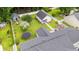 Aerial view of the backyard features a pool, patio area, trampoline, shed and lush greenery at 2529 Hunters Trail, Myrtle Beach, SC 29588