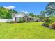 Charming one-story home boasts a well-manicured lawn, beautiful landscaping, and welcoming front porch at 2529 Hunters Trail, Myrtle Beach, SC 29588