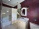 Vintage bathroom with patterned wallpaper, shower and vanity at 274 Widgeon Dr., Pawleys Island, SC 29585