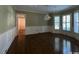 Formal dining room featuring hardwood floors, wainscoting, a chandelier, and window shutters at 274 Widgeon Dr., Pawleys Island, SC 29585