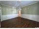 An inviting dining room showcasing hardwood floors and elegant wainscoting at 274 Widgeon Dr., Pawleys Island, SC 29585