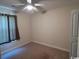 Bedroom featuring a ceiling fan, carpeted floors, and a door at 298 Weyburn St., Myrtle Beach, SC 29579