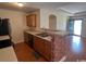 Bright kitchen features wood cabinets, breakfast bar and stainless dishwasher at 298 Weyburn St., Myrtle Beach, SC 29579