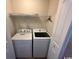Laundry room features a washing machine, dryer and storage shelf at 298 Weyburn St., Myrtle Beach, SC 29579