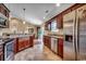 A kitchen with granite countertops, tiled floors, and stainless steel appliances at 301 Farmtrac Dr., Galivants Ferry, SC 29544