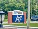 Town of Aynor sign with an A next to the hornet mascot and police car in the background at 301 Farmtrac Dr., Galivants Ferry, SC 29544