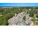An aerial view of a residential area featuring condominium buildings surrounded by lush greenery at 3015 Old Bryan Dr. # 4, Myrtle Beach, SC 29577