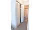 Hallway featuring a closet with folding doors and a bathroom at 3015 Old Bryan Dr. # 4, Myrtle Beach, SC 29577
