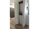 A laundry closet tucked away in the kitchen area, featuring a stackable washer and dryer unit at 3015 Old Bryan Dr. # 4, Myrtle Beach, SC 29577