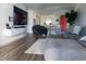 Inviting living room showcasing hardwood floors, modern furniture, and a flat-screen TV at 3015 Old Bryan Dr. # 4, Myrtle Beach, SC 29577