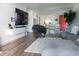 Inviting living room showcasing hardwood floors, modern furniture, and a flat-screen TV at 3015 Old Bryan Dr. # 4, Myrtle Beach, SC 29577