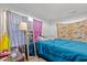 Cozy bedroom featuring a full-size bed, a floor mirror, and comfortable decor at 304 1St Ave. N, Myrtle Beach, SC 29577