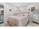 Inviting bedroom featuring a comfortable bed and a full-length mirror at 304 1St Ave. N, Myrtle Beach, SC 29577