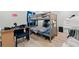 Bedroom featuring hardwood floors, a bunk bed, and a desk at 304 1St Ave. N, Myrtle Beach, SC 29577