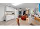 A spacious kitchen and dining area with white cabinets and modern appliances at 304 1St Ave. N, Myrtle Beach, SC 29577