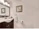 Bathroom features a sleek vanity, decorative mirror, and ample lighting at 306 21St Ave. S # 5H, Myrtle Beach, SC 29577