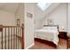 Inviting bedroom features wood floors, vaulted ceilings, skylights, and a comfortable bed at 306 21St Ave. S # 5H, Myrtle Beach, SC 29577