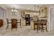 Charming eat-in kitchen featuring a chandelier, pendant lights, and bar stool seating at 306 21St Ave. S # 5H, Myrtle Beach, SC 29577