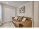 Comfortable living room features a plush sofa, decorative pillows, and natural light at 306 21St Ave. S # 5H, Myrtle Beach, SC 29577