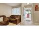 Inviting living room with comfortable sofas, tile flooring, and natural light at 306 21St Ave. S # 5H, Myrtle Beach, SC 29577
