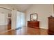 Spacious main bedroom features hardwood floors, ample natural light, and elegant furnishings at 306 21St Ave. S # 5H, Myrtle Beach, SC 29577
