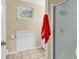 Practical bathroom with tile floor, white walls and a glass enclosed shower at 3969 Murrells Inlet Rd., Murrells Inlet, SC 29576