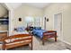 Bright bedroom with two twin beds, neutral walls, and a ceiling fan at 3969 Murrells Inlet Rd., Murrells Inlet, SC 29576
