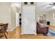 Hallway featuring wood floors leading to the living room and other areas at 3969 Murrells Inlet Rd., Murrells Inlet, SC 29576