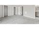 Bedroom with gray carpet and two closets with bi-fold doors at 4049 Fairway Lakes Dr. # 4049, Myrtle Beach, SC 29577