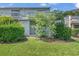 Inviting exterior with well-manicured lawn and mature landscaping at 4049 Fairway Lakes Dr. # 4049, Myrtle Beach, SC 29577