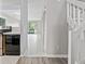 Hallway between kitchen and living room with access to the stairwell and closet at 4049 Fairway Lakes Dr. # 4049, Myrtle Beach, SC 29577