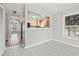 The living room features gray walls, tile floors, and view of the kitchen at 4049 Fairway Lakes Dr. # 4049, Myrtle Beach, SC 29577