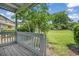 Charming porch view with lush greenery and a well-maintained lawn at 4049 Fairway Lakes Dr. # 4049, Myrtle Beach, SC 29577