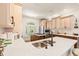 Bright kitchen with an island cooktop, ample counter space, and stylish cabinetry at 41 Sunfield Dr., Calabash, SC 28467