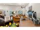 Cozy living room with vaulted ceilings, fireplace, hardwood floors and relaxed leather sofas at 41 Sunfield Dr., Calabash, SC 28467