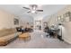 Spacious bonus room featuring multiple seating areas, a desk and great natural light at 413 Goldenrod Circle # 2B, Little River, SC 29566
