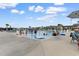 Community pool with lounge chairs and plenty of people enjoying the summer sun at 413 Goldenrod Circle # 2B, Little River, SC 29566