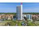 Stunning oceanfront condominium with pools, palm trees, manicured lawns, and panoramic views of the coastline at 5511 N Ocean Blvd. # 1801, Myrtle Beach, SC 29577