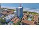 Aerial view of a beachside resort featuring a mix of high-rise and low-rise buildings with beach access at 5511 N Ocean Blvd. # 1801, Myrtle Beach, SC 29577