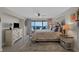 Relaxing main bedroom features a ceiling fan and balcony access at 5511 N Ocean Blvd. # 1801, Myrtle Beach, SC 29577