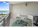 Enjoy outdoor living on this private balcony with comfortable seating and views of the ocean at 5523 North Ocean Blvd. # 803, Myrtle Beach, SC 29577