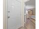 Entryway view into bedroom with dresser, mirror and comfortable bed at 5523 North Ocean Blvd. # 803, Myrtle Beach, SC 29577