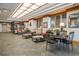A well-lit lobby area with tile flooring, seating and tables at 5523 North Ocean Blvd. # 803, Myrtle Beach, SC 29577